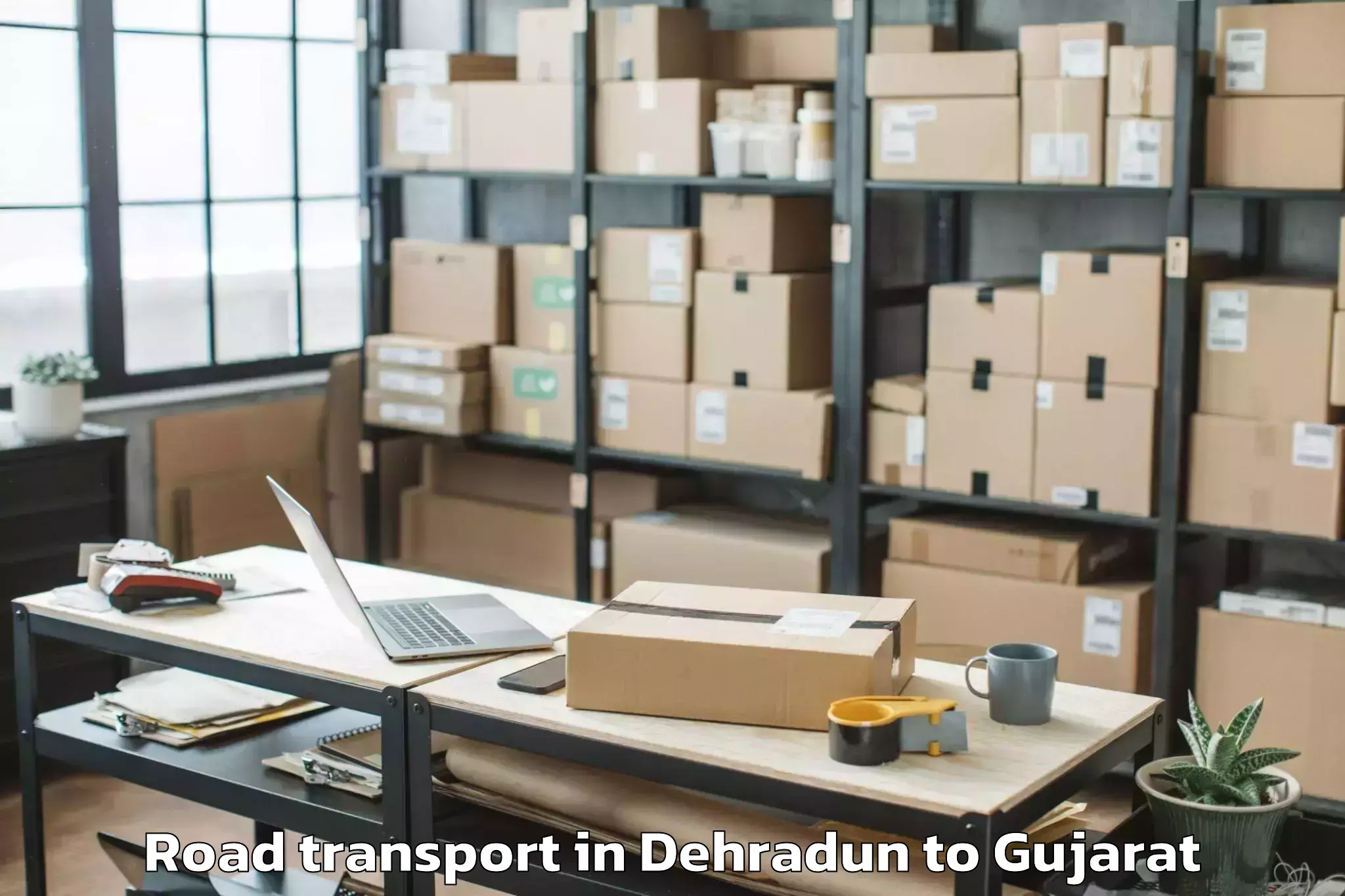 Quality Dehradun to Vansda Road Transport